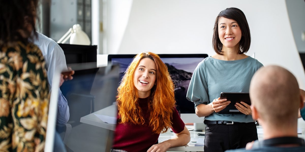 group of people in office meeting