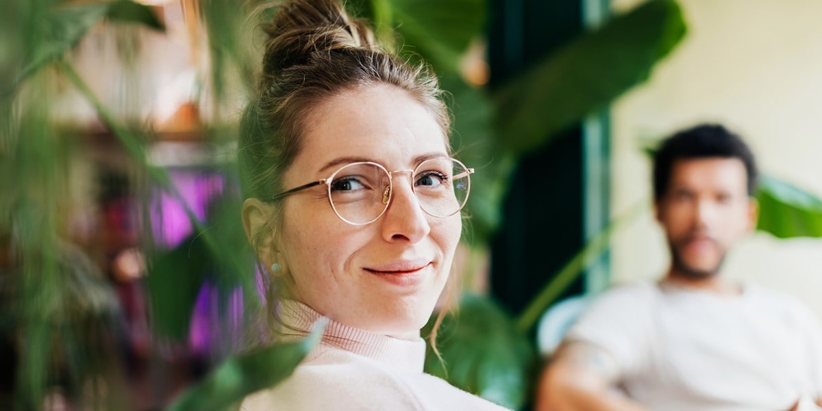 woman in office smiling