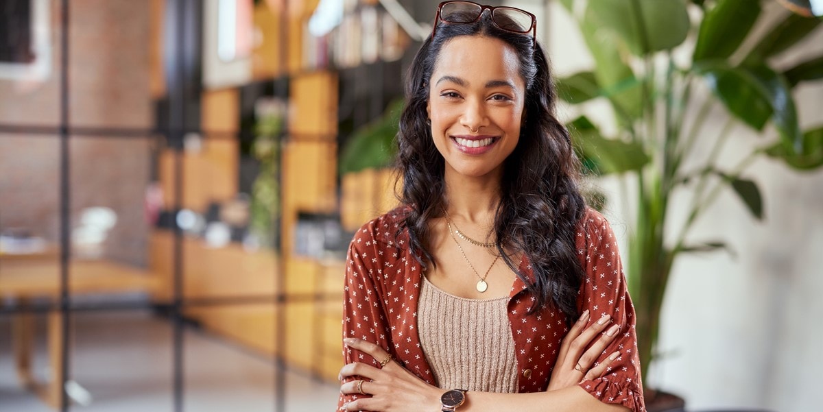 woman smiling, in the office