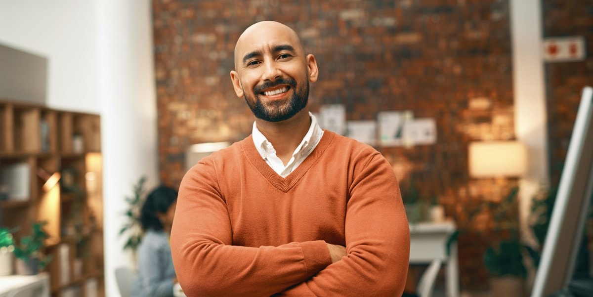 man in office smiling